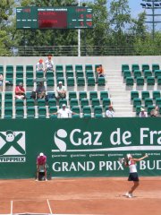 Tennis scoreboard with moving message